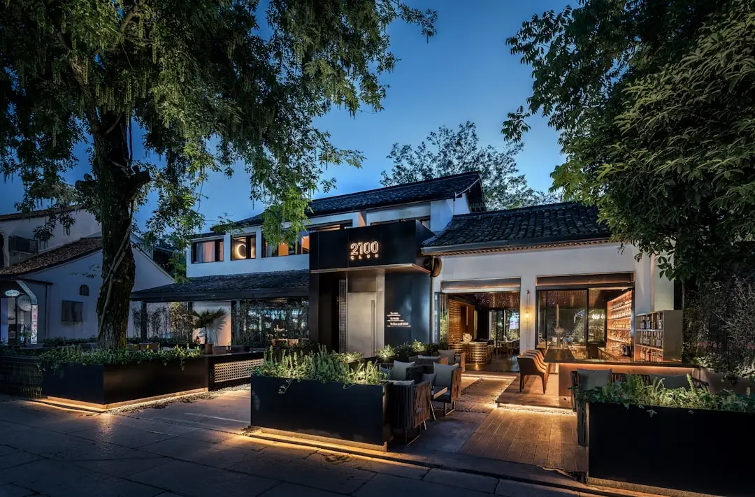 a building with a courtyard and trees